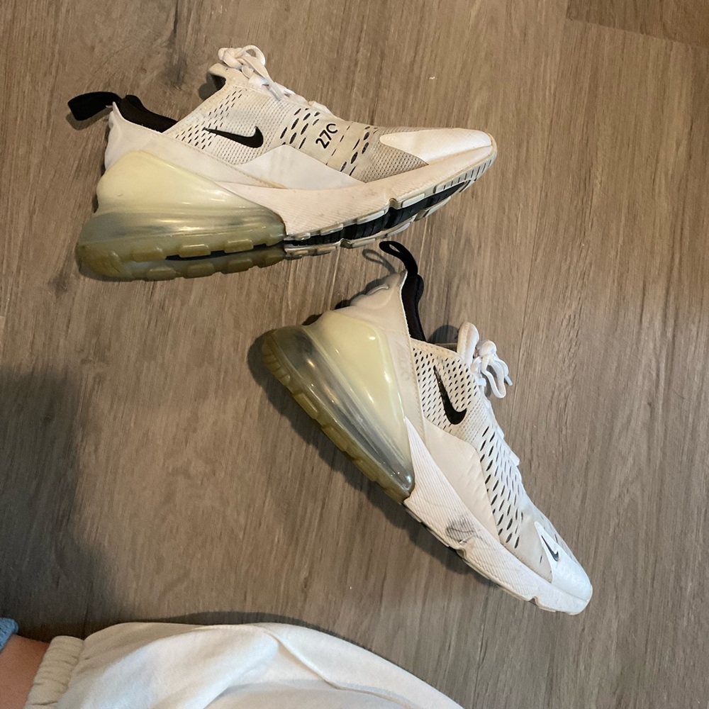 White and black womens nike 270s